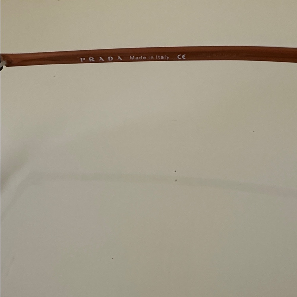 Prada Sleek Bronze Titanium Frameless Rectangular Prescription Glasses Frame - Picture 9 of 15